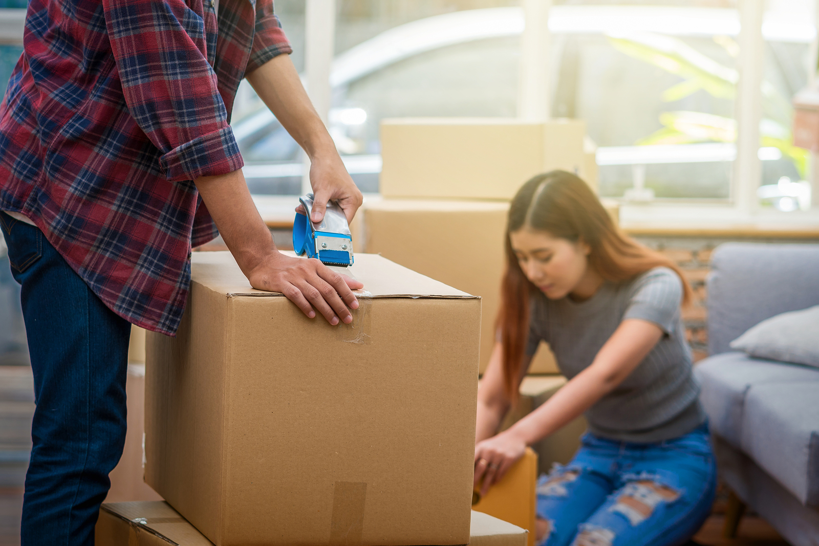 Closeup Asian Young Couple Packing The Big Cardboard Box For Mov